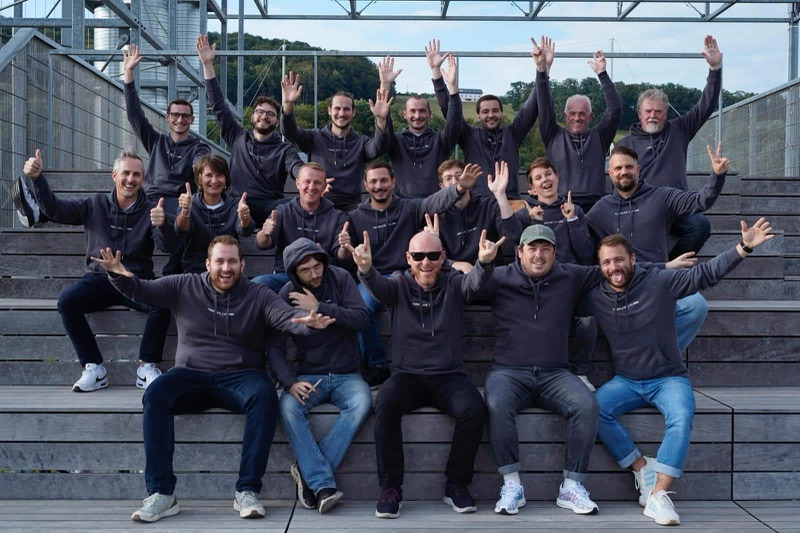The qapture team on a grandstand in Linz