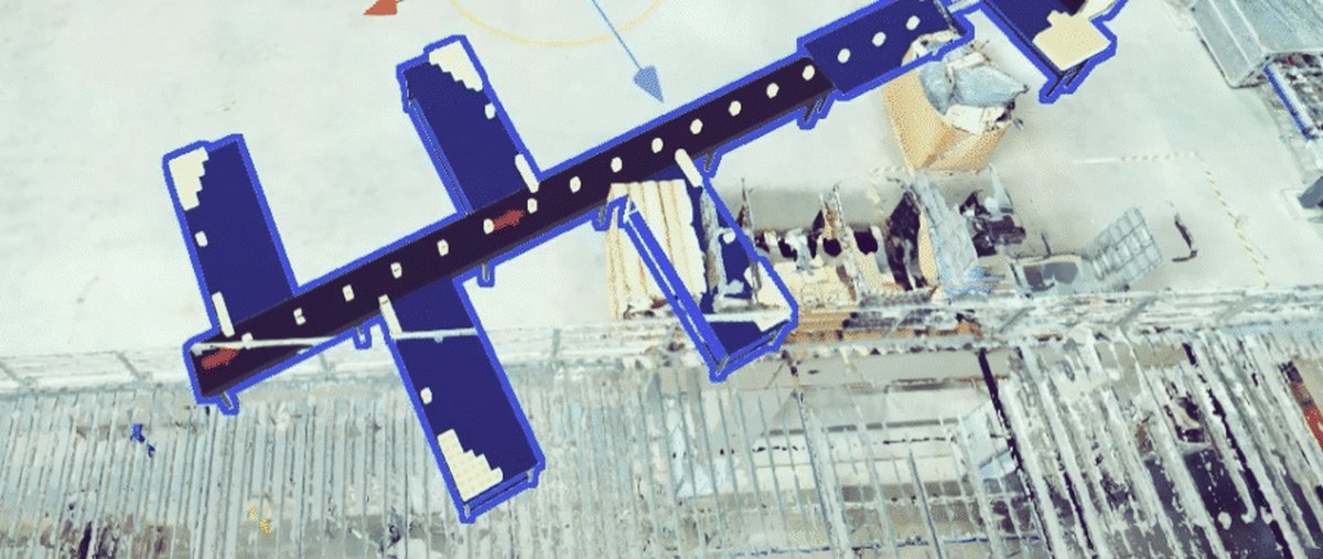 Planned conveyors and racking highlighted in blue in the scanned model of the hall